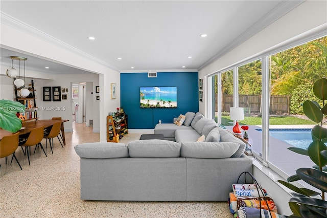 living area featuring recessed lighting, light speckled floor, and crown molding