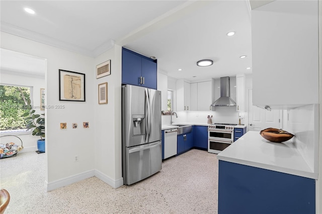 kitchen featuring double oven range, blue cabinetry, stainless steel fridge with ice dispenser, white dishwasher, and wall chimney range hood