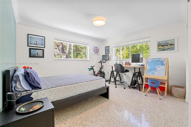 bedroom featuring speckled floor and crown molding