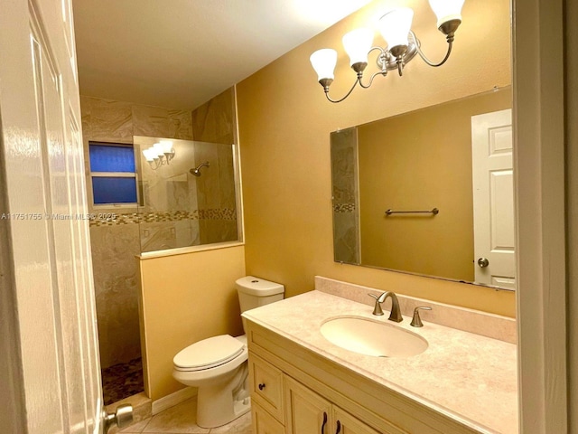 full bathroom with toilet, an inviting chandelier, tile patterned flooring, vanity, and a walk in shower