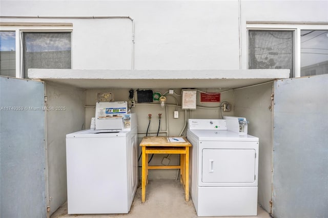 washroom featuring independent washer and dryer