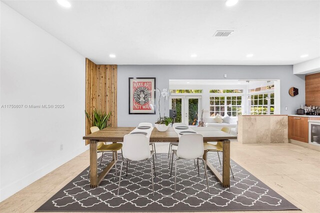 dining room featuring french doors, visible vents, and recessed lighting