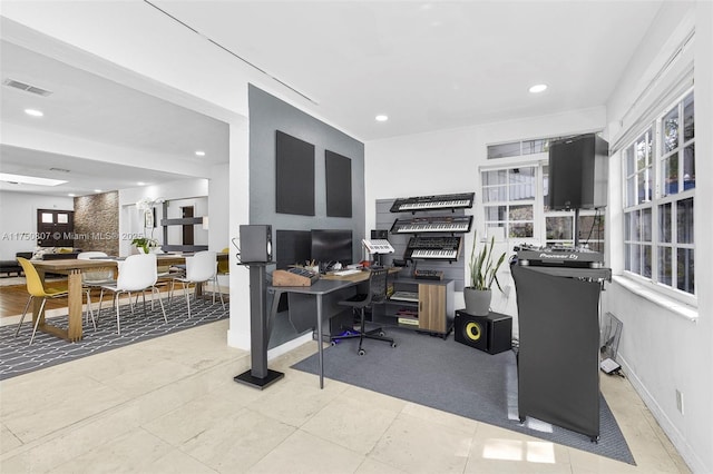 home office with recessed lighting, visible vents, and baseboards