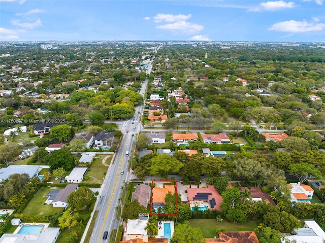 birds eye view of property with a residential view