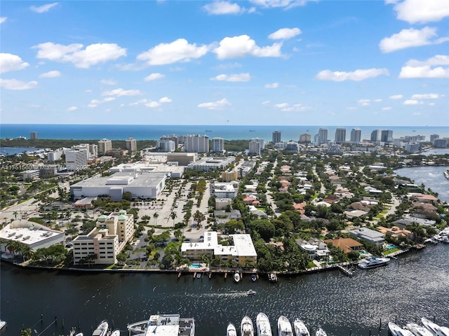 aerial view featuring a water view and a city view