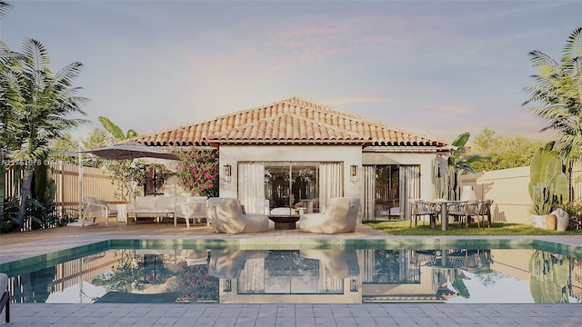 rear view of house featuring a tile roof, outdoor lounge area, fence, and a fenced in pool