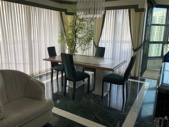 dining room with a chandelier