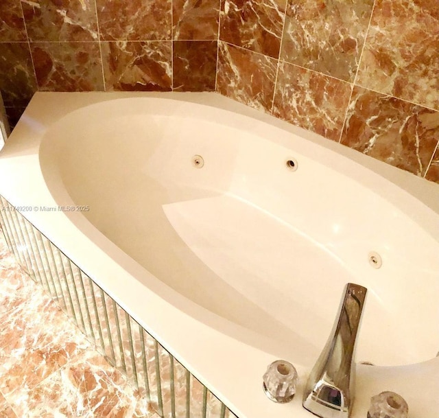 room details featuring a whirlpool tub