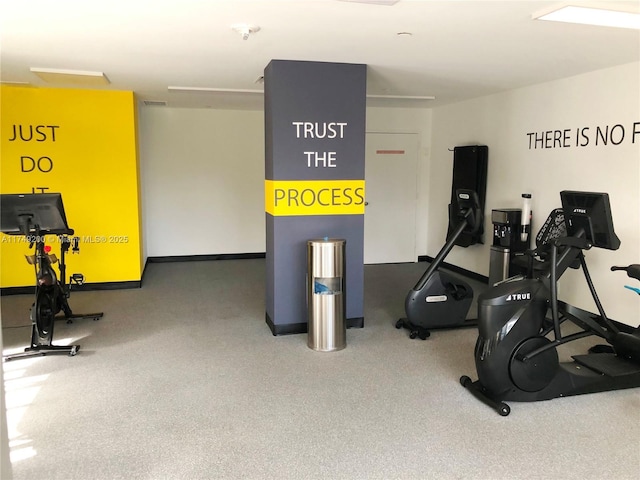 exercise room with baseboards