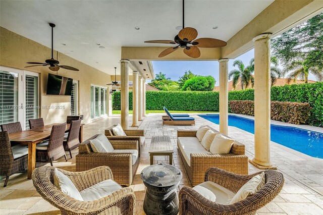 16721 SW 86th Ct, Palmetto Bay, FL 33157 - fenced backyard with french doors, ceiling fan, and a patio