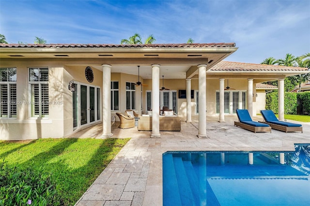 16721 SW 86th Ct, Palmetto Bay, FL 33157 - back of property featuring french doors, stucco siding, a patio area, and an outdoor pool