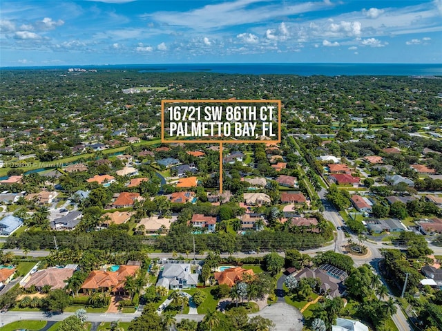 16721 SW 86th Ct, Palmetto Bay, FL 33157 - aerial view of property and surrounding area featuring nearby suburban area