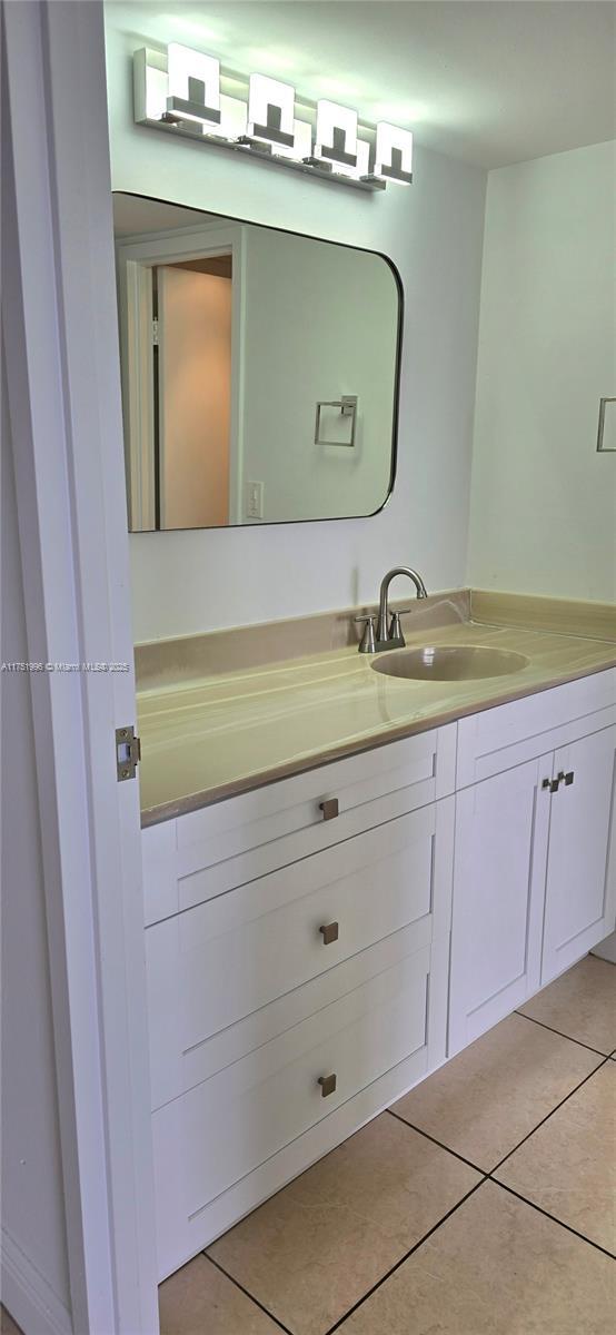 bathroom featuring vanity and tile patterned floors