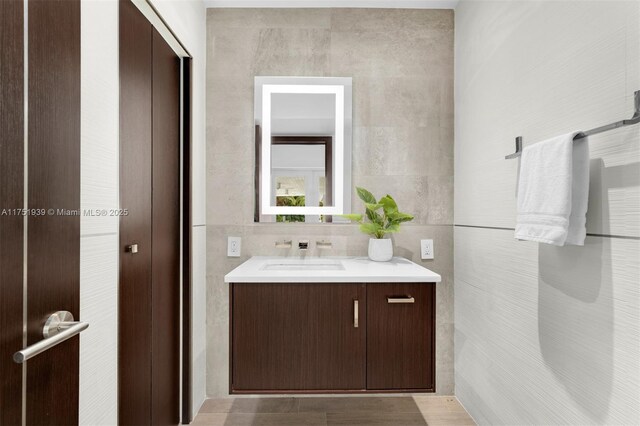 6784 SW 97th St, Pinecrest, FL 33156 - bathroom featuring tile walls and vanity
