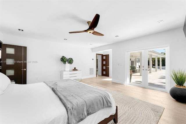 6784 SW 97th St, Pinecrest, FL 33156 - bedroom with access to outside, french doors, a ceiling fan, and light wood-style floors