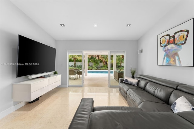 6784 SW 97th St, Pinecrest, FL 33156 - tiled living room featuring french doors, baseboards, and vaulted ceiling