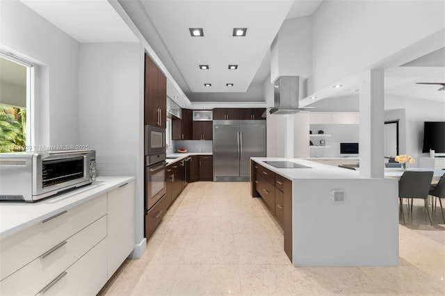 6784 SW 97th St, Pinecrest, FL 33156 - kitchen with built in appliances, dark brown cabinetry, modern cabinets, and a kitchen island