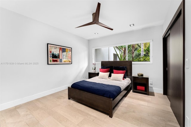 6784 SW 97th St, Pinecrest, FL 33156 - bedroom with light wood-style flooring, baseboards, and ceiling fan