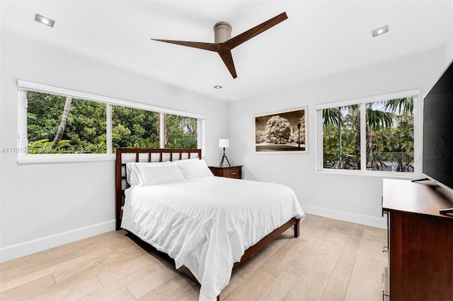 6784 SW 97th St, Pinecrest, FL 33156 - bedroom featuring baseboards, light wood finished floors, and a ceiling fan