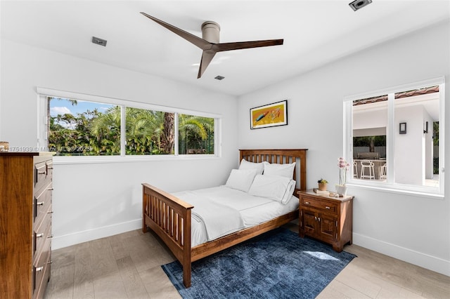 6784 SW 97th St, Pinecrest, FL 33156 - bedroom with light wood-style floors, baseboards, and a ceiling fan