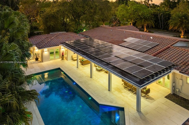 6784 SW 97th St, Pinecrest, FL 33156 - swimming pool with a patio area, an exterior structure, an outbuilding, and french doors