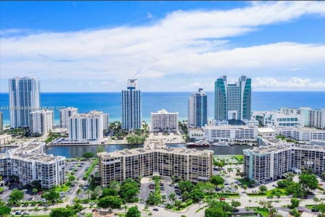 bird's eye view with a water view and a city view