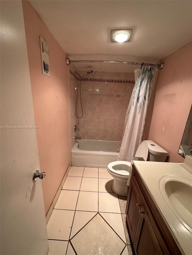 bathroom featuring visible vents, toilet, shower / bath combo, vanity, and tile patterned floors