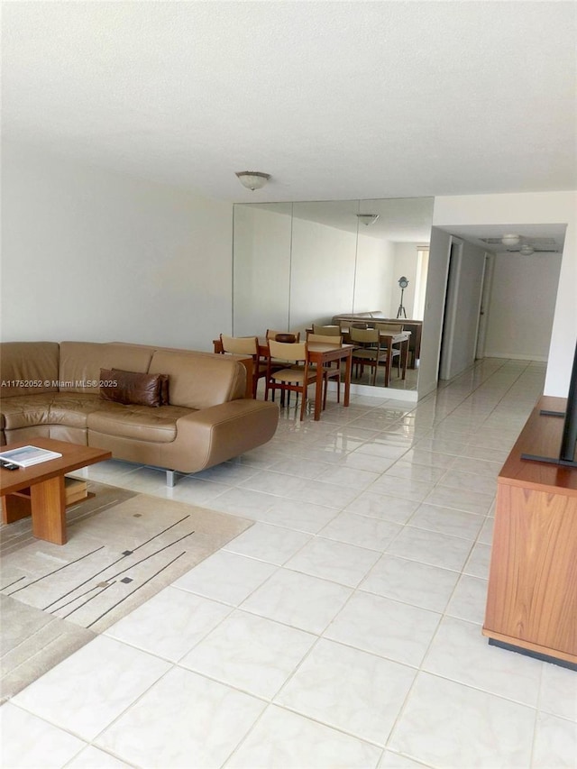 2650 S Course Dr Unit 410, Pompano Beach, FL 33069 - living area with light tile patterned flooring
