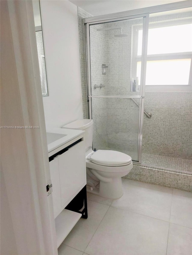 2650 S Course Dr Unit 410, Pompano Beach, FL 33069 - full bath featuring tile patterned floors, vanity, toilet, and a shower stall