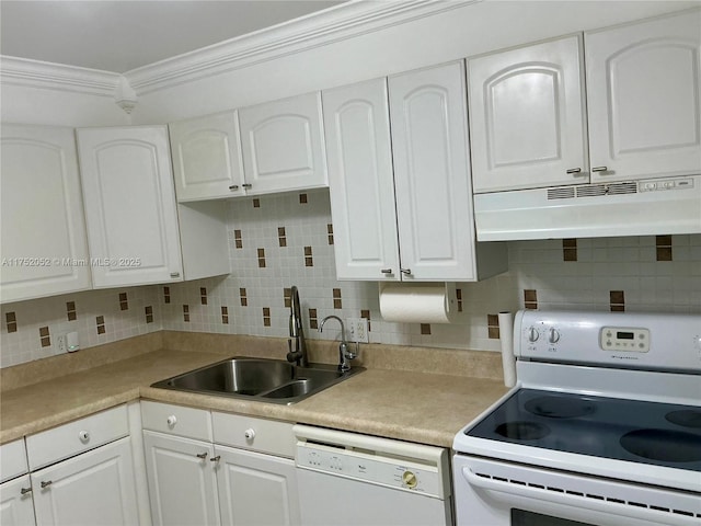 kitchen featuring white appliances, a sink, white cabinets, and under cabinet range hood