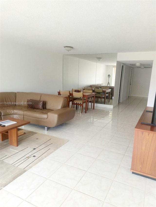 2650 S Course Dr Unit 410, Pompano Beach, FL 33069 - living room featuring light tile patterned flooring