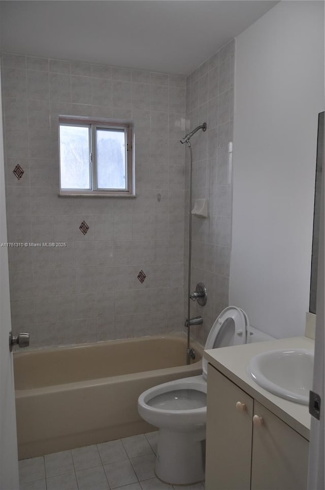 full bathroom with toilet, shower / tub combination, vanity, and tile patterned floors