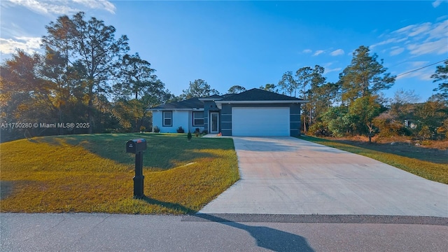 ranch-style home with an attached garage, driveway, a front yard, and stucco siding