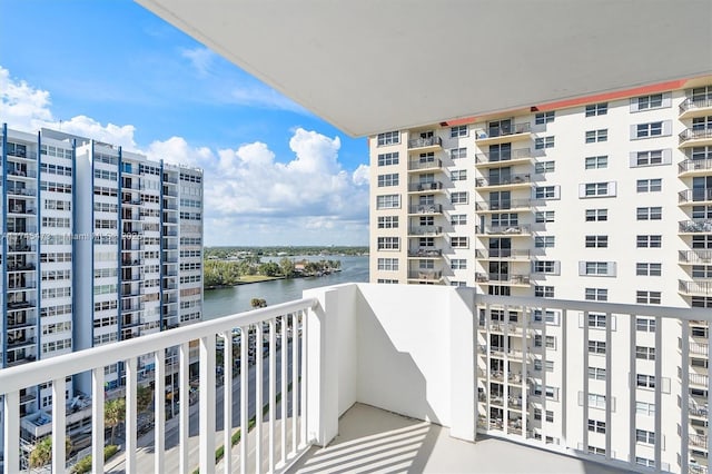 balcony featuring a water view