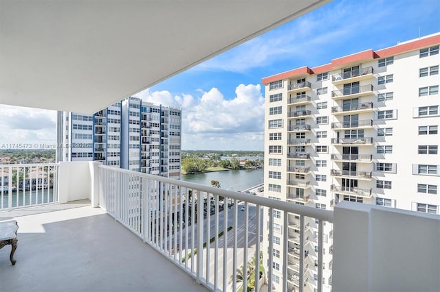 balcony featuring a water view