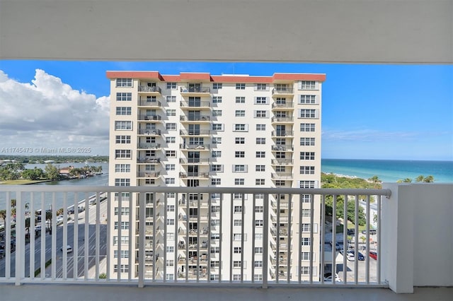 balcony featuring a water view