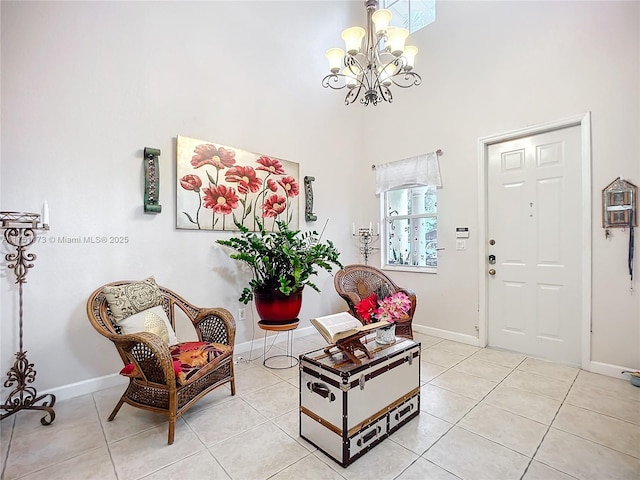 entryway with baseboards and light tile patterned flooring