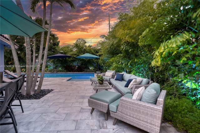 view of patio featuring an outdoor pool and outdoor lounge area