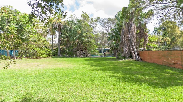 view of yard featuring fence