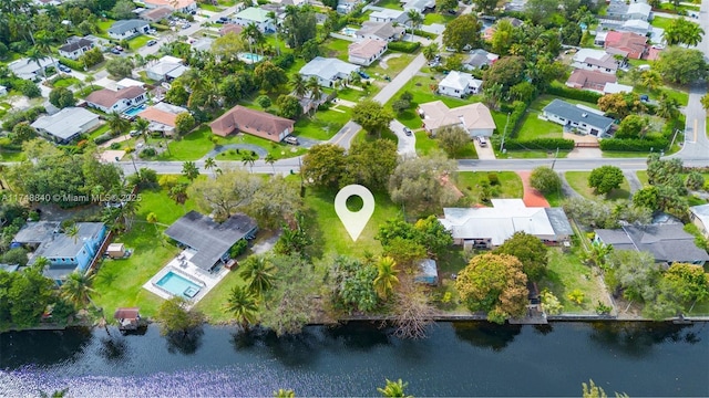 aerial view with a residential view and a water view