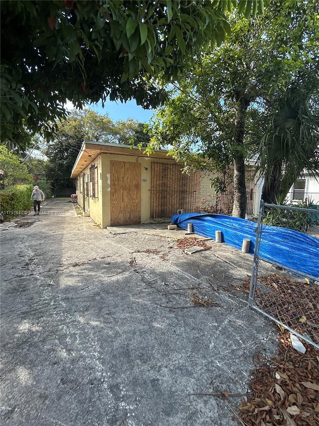 view of pool featuring fence