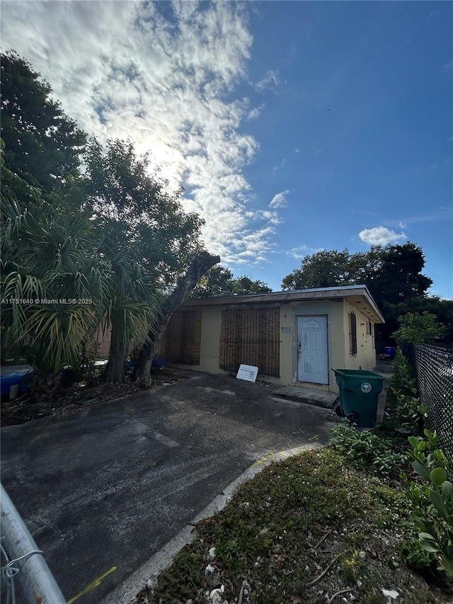 garage featuring fence