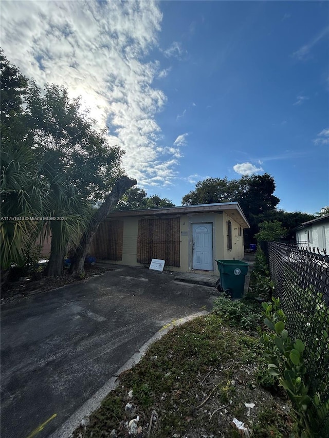 garage featuring fence