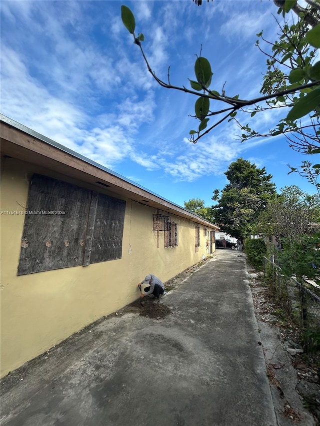 view of property exterior with stucco siding