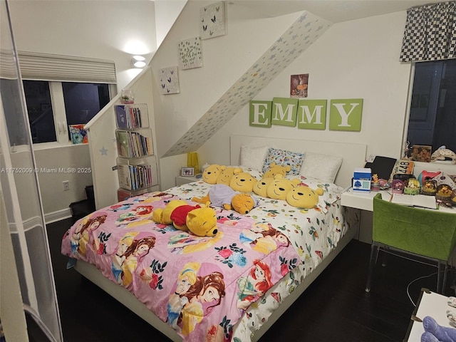 bedroom featuring wood finished floors