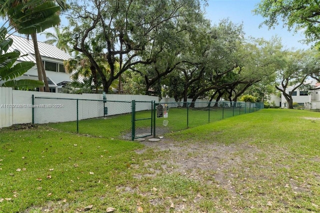 view of yard featuring a gate and fence