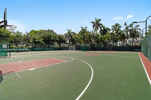 view of sport court with community basketball court and fence