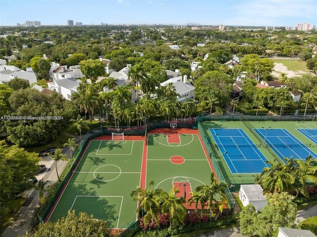 view of basketball court featuring a tennis court