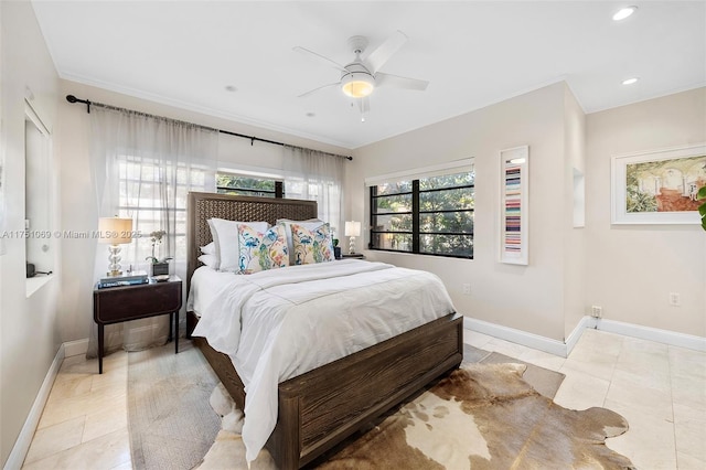 bedroom with crown molding, light tile patterned floors, recessed lighting, and baseboards