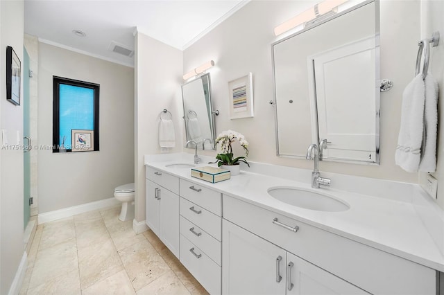 bathroom with baseboards, visible vents, a sink, and ornamental molding